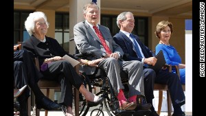 Former U.S. President George H.W. Bush (2nd L) wears pink socks as he attends the dedication ceremony for the George W. Bush Presidential Center in Dallas, April 25, 2013. Also pictured are former first lady Barbara Bush (L), former President George W. Bush (2nd R) and former first lady Laura Bush. REUTERS/Jason Reed (UNITED STATES - Tags: POLITICS) Reuters /JASON REED /LANDOV Photographers/Source: JASON REED/Reuters /Landov 
