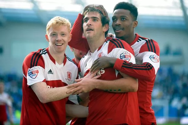 Danny Graham celebrates with Luke Williams and Nathaniel Chalobah