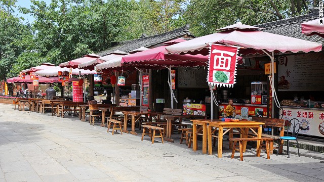 Mansion feasts draw visitors to Anren but traditional Sichuan food can be found at street stalls.