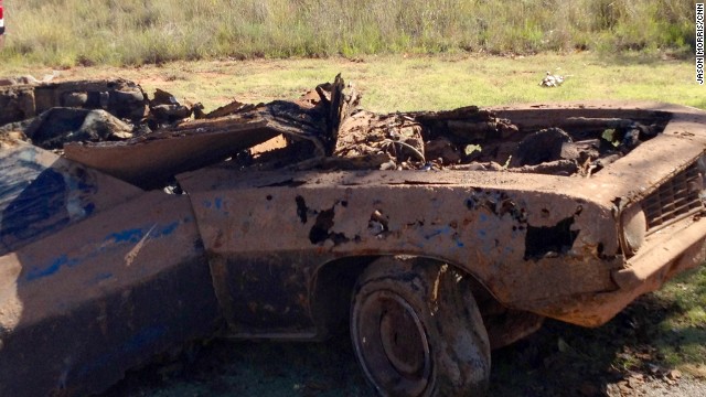 The Camaro pulled from the lake is seen last year after investigators began their work.