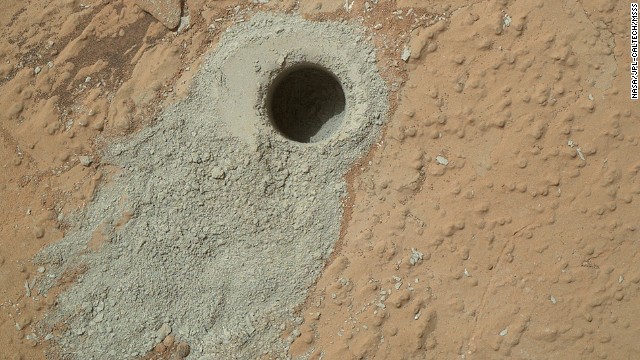 Curiosity drilled into a rock target called "Cumberland" on May 19, 2013, and it collected a powdered sample of material from the rock's interior. The sample will be compared to an earlier drilling at the "John Klein" site, which has a similar appearance and is about 9 feet away. 