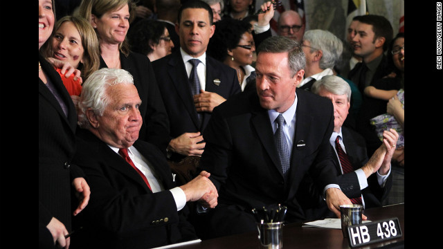 Maryland Gov. Martin O'Malley, center, shakes hands with Senate President Thomas V. "Mike" Miller after signing a same-sex marriage bill in March 2012. The law was challenged, but voters approved marriage equality in a November 2012 referendum.