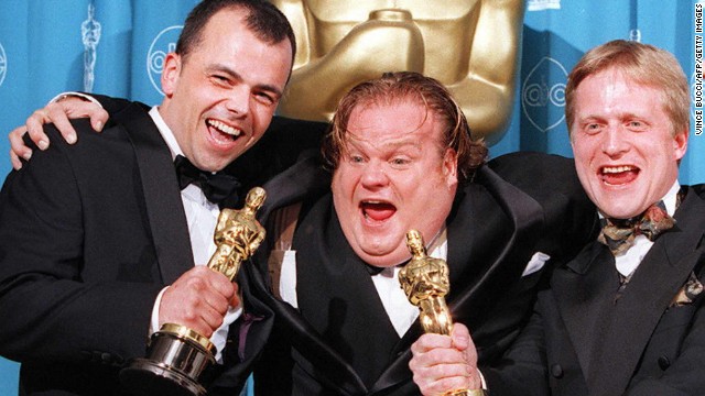 Chris Farley, at center with filmmakers Tyron Montgomery, left, and Thomas Stellmach after they won the Oscar for best animated short film for "Quest" in 1997. Farley<a href='http://ift.tt/1engKuh' target='_blank'> reportedly was working on</a> the animated film "Shrek" when he died of an overdose in 1997. His "SNL" colleague Mike Myers would go on to snag the role. 