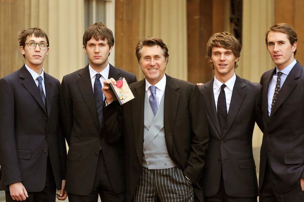 Bryan Ferry with his sons (from left to right) Merlin, Isaac, Tara and Otis at Buckingham Palace