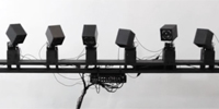 Tiny Robotic Backup Dancers Controlled by a Singer's Voice