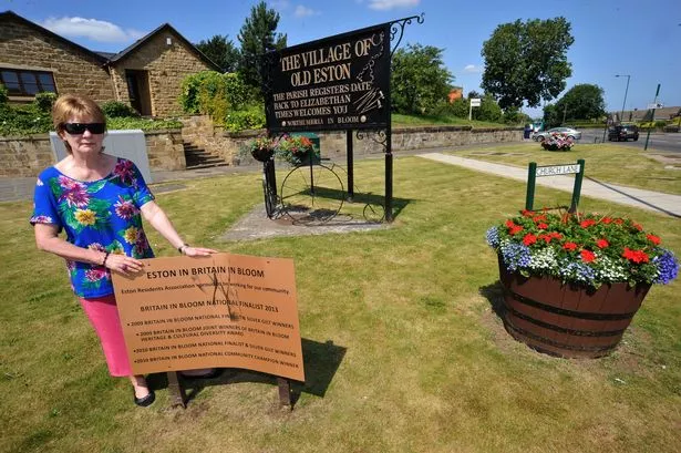 Vandalism (again) to the floral displays at Eston as Northumbria In Bloom judges are due. Ann Higgins is pictured with some of the damage near to an area near to the High St. opposite the Ship Inn Pub.