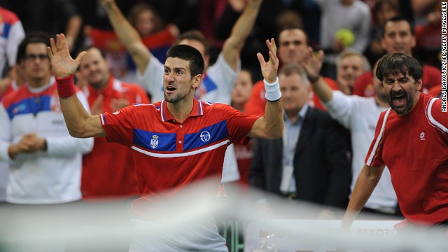 Djokovic celebrates after a historic win against Gael Monfils at the Davis Cup tennis match finals between Serbia and France in December 2010.