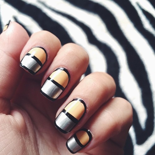 anti-football fingers feat. @maybelline patent black, bleached...