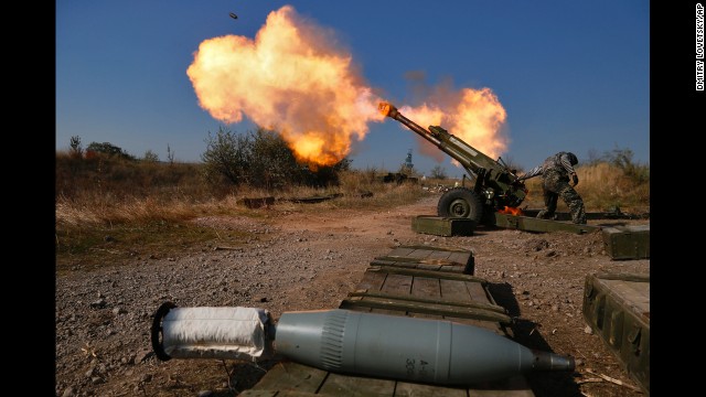 Pro-Russian rebels fire artillery Tuesday, October 14, at Donetsk Sergey Prokofiev International Airport, which is on the outskirts of Donetsk.