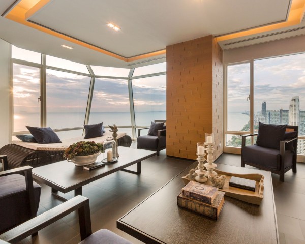 The rooms in this building naturally take full advantage of their beachfront location. The higher the floor, the more expansive the panorama from these condos. Modern interior decor is comfortable and not too fussy, meaning it is easy enough to come inside from a day spent on the sand and not worry about leaving a few grains on the wooden furniture.