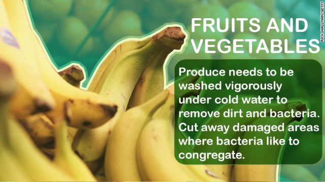 Bacteria can collect on the skin of fruits and vegetables. So even if there is an outer layer you'll be peeling off, you need to wash it thoroughly to prevent transmission to the part you're eating. Source: NIH