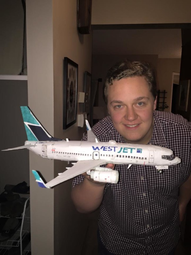 My friend's son with autism makes airplanes to scale out of cardboard. Here is his WestJet Boeing 737-700!
