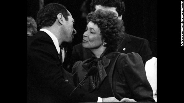 Cuomo kisses his wife, Matilda, during his inauguration as New York governor in 1983. 