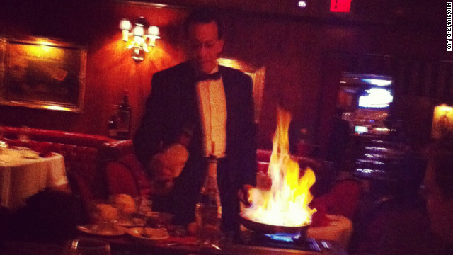 A waiter at The Golden Steer steakhouse fires up a tableside pan of bananas Foster. The restaurant has served Rat Pack regulars and tourists alike since it opened in 1958.
