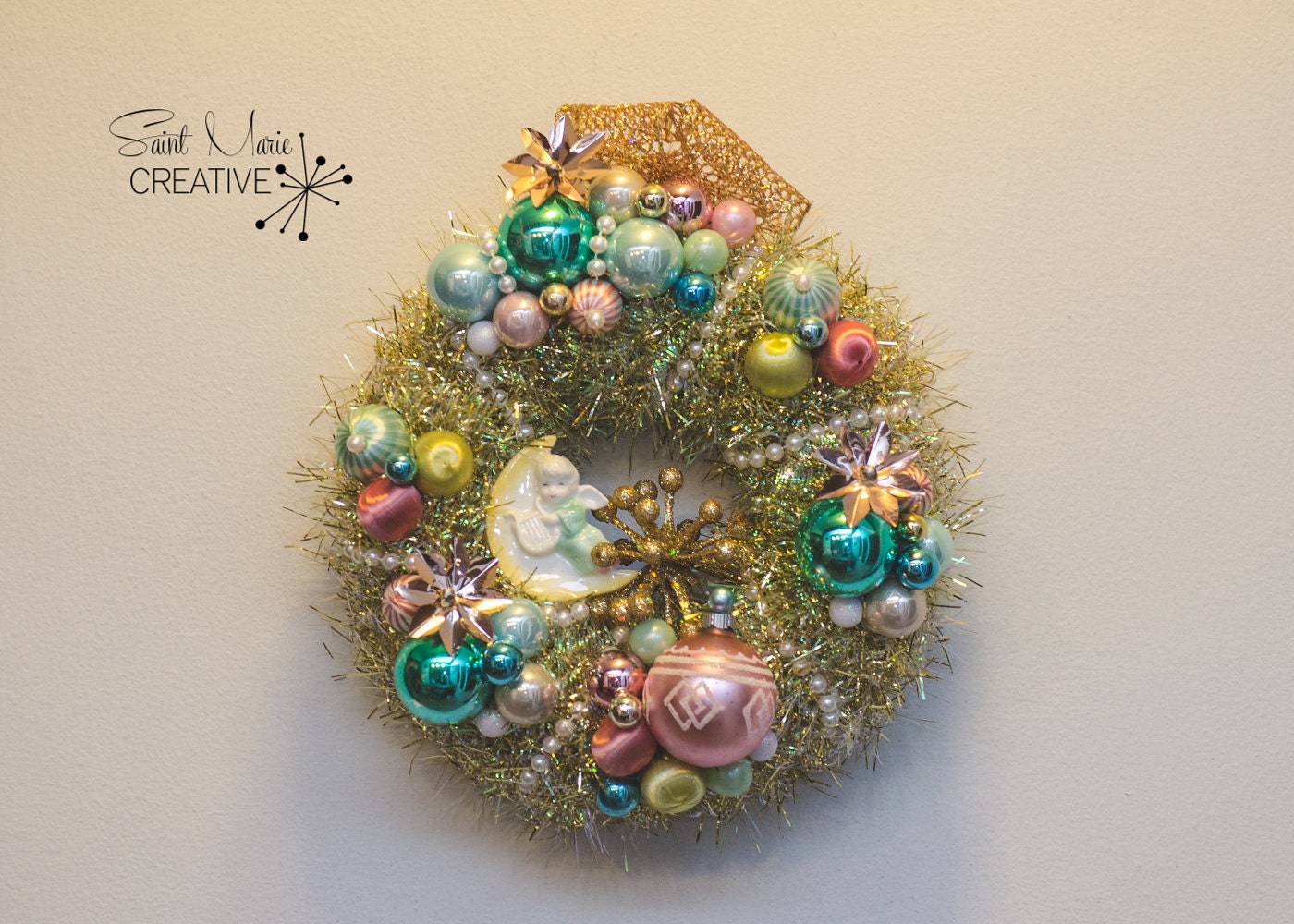 One of my mini creations! This 10" wreath in pastel shades would be great for a baby shower or for your Christmas decor.