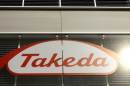 The logo of Japanese Takeda Pharmaceutical Co is seen at an office building in Glattbrugg