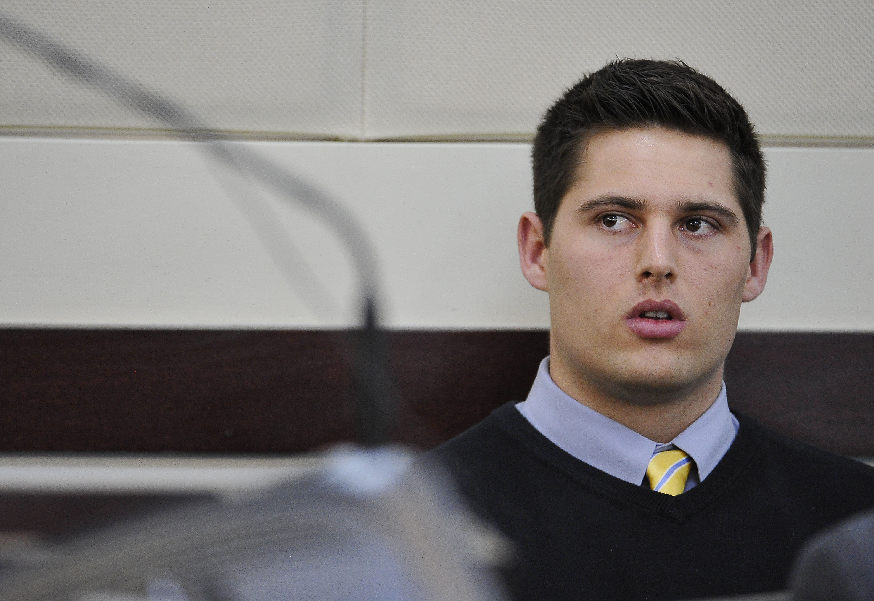 Defendant Brandon Vandenburg listens as his attorney Fletcher Long argues for acquittal during the his trial Monday, Jan. 26, 2015, in Nashville, Tenn. Tenn. Former Vanderbilt football players Vandenburg and Cory Batey are standing trial on five counts of aggravated rape and two counts of aggravated sexual battery. (AP Photo/Larry McCormack, Pool