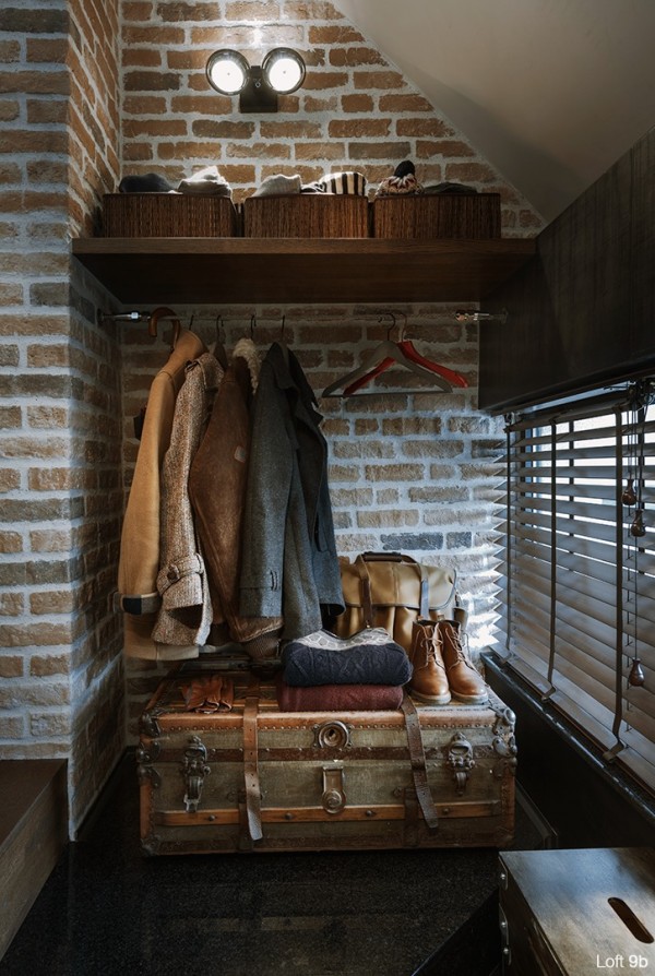 Storage is always a challenge in smaller apartments. But from an open-air coat closet to a wardrobe hidden inside what looks like a vintage suitcase, the space does not lack for practical storage. Even the coffee table, also styled as a suitcase, opens up for blankets and other comforts.