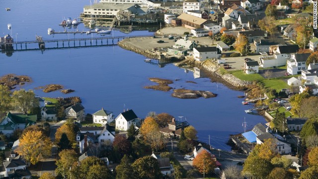 Visitors to Boothbay Harbor on Maine's central coast can browse art galleries, take a whale-watching tour or admire the views from a wooden footbridge, seen in the upper part of this photo.