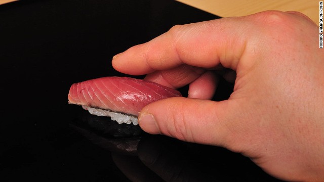 1. Grip the sushi -- don't squeeze.