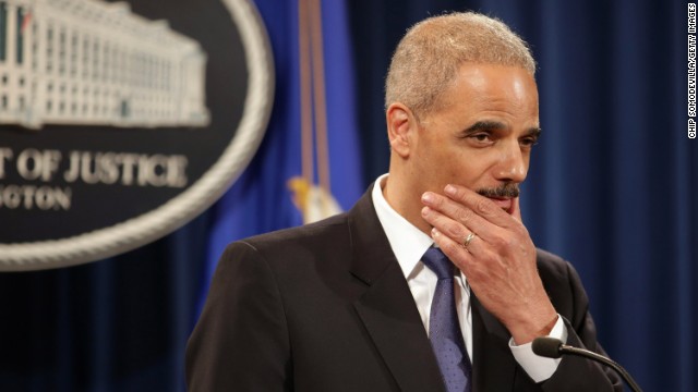 Holder takes questions during a news conference in May 2013. He said he recused himself from a national security leak investigation in which prosecutors obtained the phone records of Associated Press journalists.