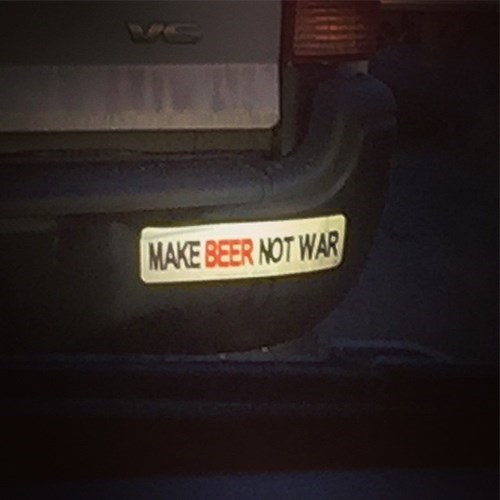bumper sticker says "make beer not war"