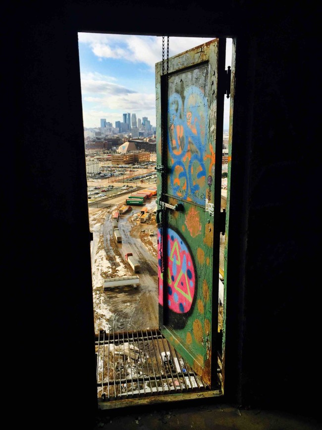 Minneapolis from the top floor of an abandoned mill we were exploring yesterday.