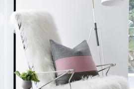Plush decor and pinks add femininity to the space