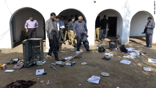 Pakistani members of a committee investigate the killing. The accusation the couple had desecrated the Quran was announced via a mosque loudspeaker, the HRCP said.
