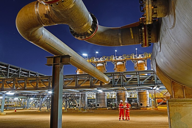 Workers at BHP Billiton's Macedon gas plant in Australia’s Western Australia state.