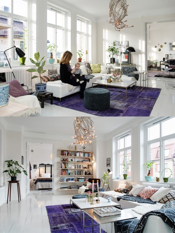 A lovely purple rug brings a pop of color and texture to this bright white living room.