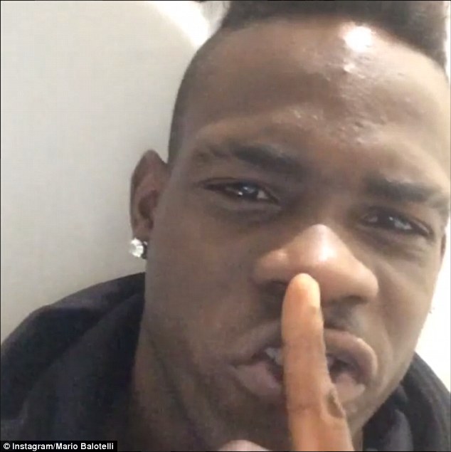 Mario Balotelli puts his finger to his mouth as he tells people to 'shut up' at the end of his Instagram video