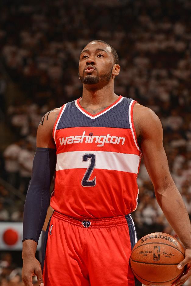 TORONTO, CANADA - APRIl 21: John Wall #2 of the Washington Wizards shoots a free throw in Game Two of the Eastern Conference Quarterfinals against the Toronto Raptors during the 2015 NBA Playoffs on April 21, 2015 at the Air Canada Centre in Toronto, Ontario, Canada. (Photo by Ron Turenne/NBAE via Getty Images)