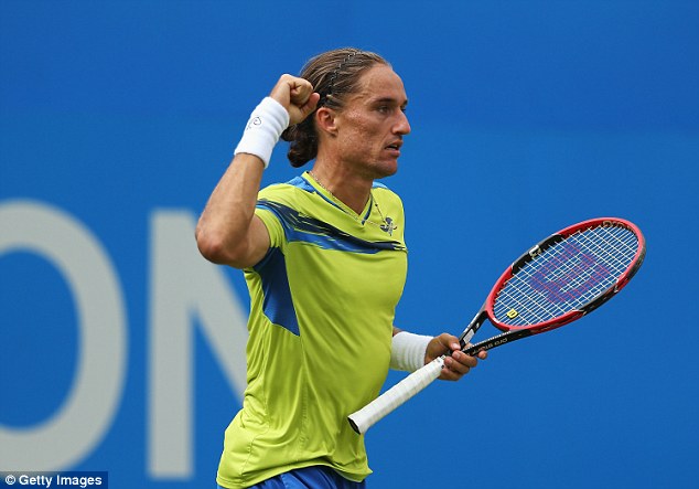 Dolgopolov celebrates his famous victory after winning the match in two hours and 13 minutes
