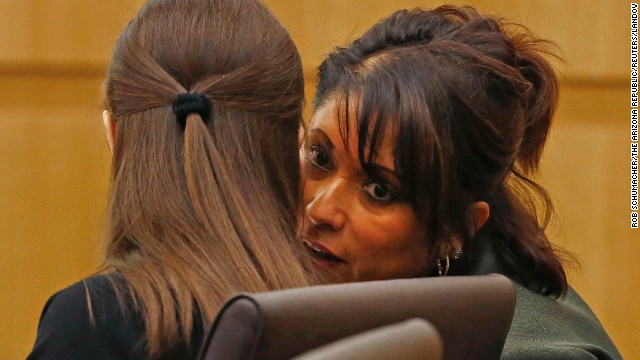 Mitigation specialist Maria DeLaRosa whispers to Arias during closing arguments on May 3. Arias' defense team denied that she went on a meticulously planned "covert mission" to Arizona to kill her ex-boyfriend and then hide her tracks.
