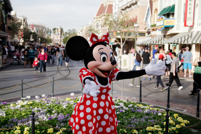 Minnie Mouse entertains visitors at Disneyland in Anaheim, California on Thursday, Jan. 22, 2015. 