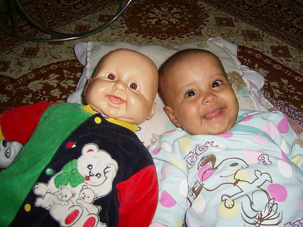 Baby With A Look Alike Doll