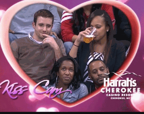 dating kiss cam gifs Love Makes You Throw Caution (and Beer) to the Wind! 