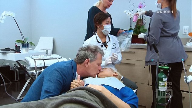 Tender moment: Yolanda and David kissed as she underwent a dental procedure