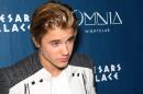 Justin Bieber has attended a mediation session over a lawsuit against him in which a photographer alleges that one of the star's bodyguards assaulted him