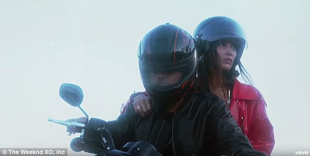 Making a getaway: Tuesday also marked the premiere of the Tell Your Friends singer's music video for In The Night, in which he takes Bella for a ride on his motorbike