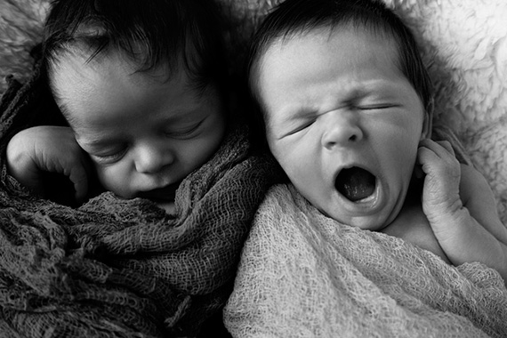 newborn twins yawning