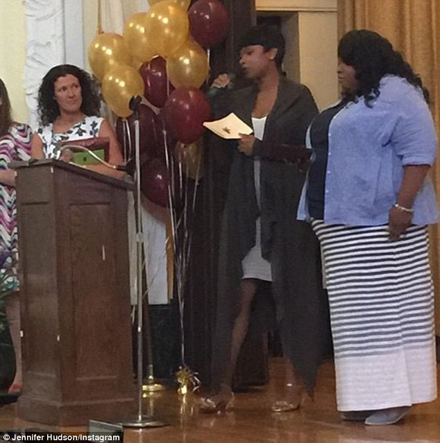 Bitter sweet: Jennifer Hudson and her sister Julia spoke at her late nephew's posthumous graduation at Gunsaulus Scholastic Academy in Chicago, Illinois on Friday