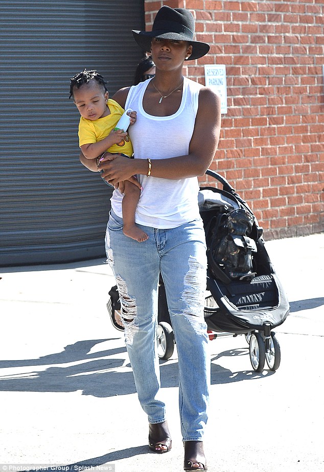 Looking fabulous: Kelly Rowland was seen leaving a studio in Hollywood carrying her seven-month-old son Titan on Friday