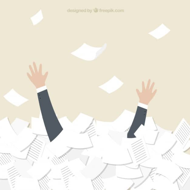 Businessman-swimming-in-documents