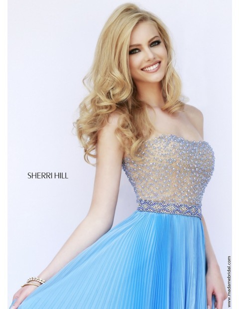 Hot Prom Dresses Sparkling beads festoon the nude bodice of... prom dress April 25, 2015 at 10:10PM