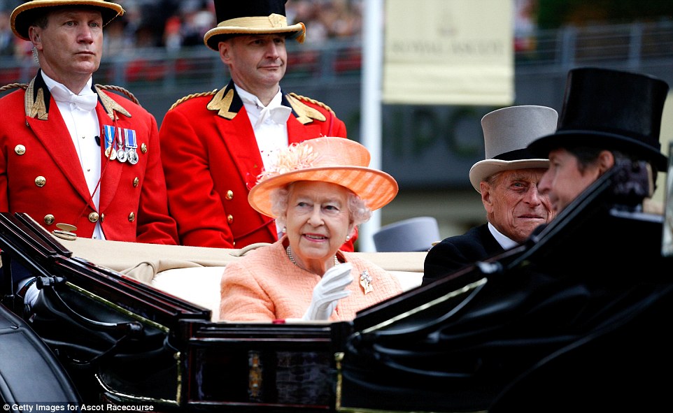 Gracious: The Queen waves at the grandstand as she and the Duke of Edinburgh lead the Royal Procession on the final day of the meet