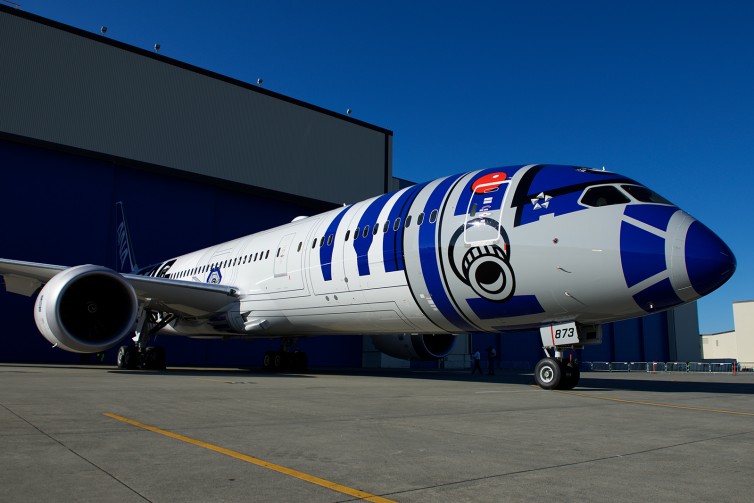 JA873A, better known as "The R2-D2 plane" rolled out of the paint hangar - Photo: Bernie Leighton | AirlineReporter