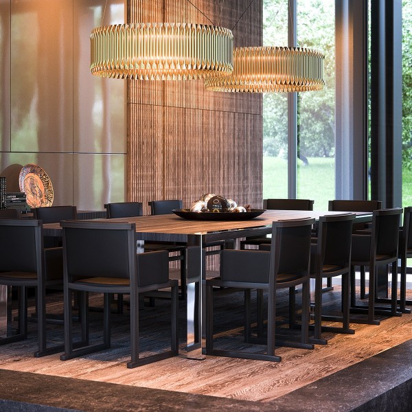 Hidden behind the stone-textured entertainment console is a spectacularly luxurious dining room. Here, gorgeous wooden elements tie into the outdoors. It's warm and decorative, in contrast to the cool and clean living spaces throughout the rest of the home.