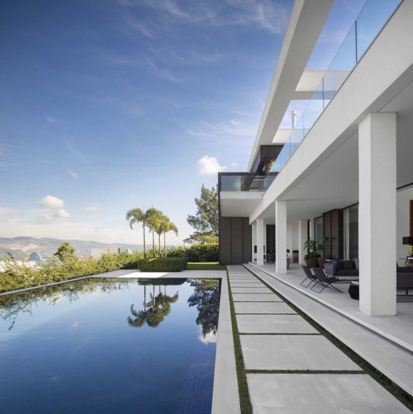 The pool area, in keeping with the theme, takes on an infinity feel with breathtaking views. The use of sharp angles and clean lines in the exterior stonework is tempered by the soft curves of the surrounding mountains and lush vegetation. This is an area perfect for family entertaining.